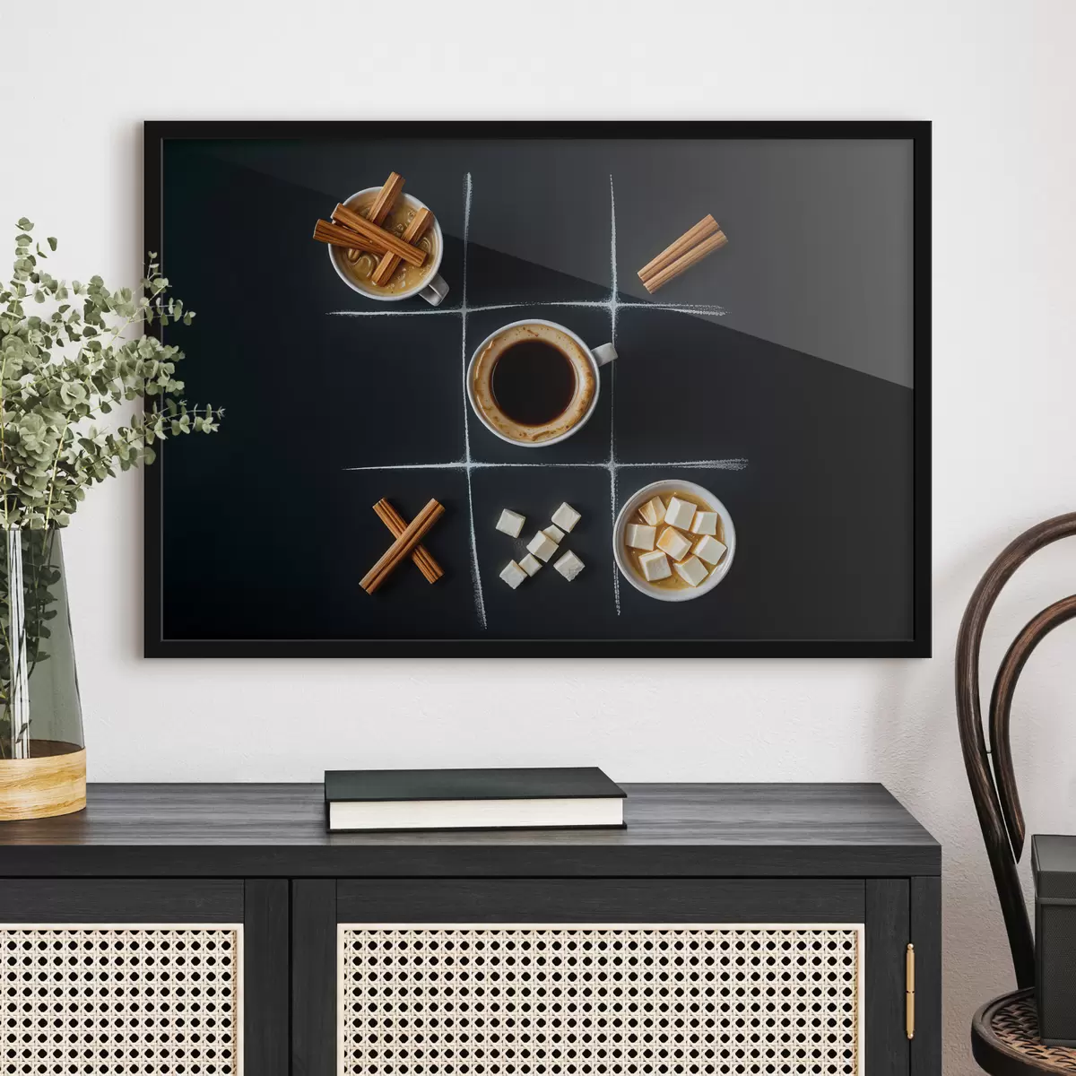 Plakat Tass kohvi kaneelipulkade, suhkrukuubikute ja vahukommidega, mis on paigutatud tic-tac-toe-võrku f40163