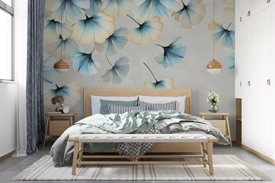 Fototapeedid Pastelsiniste ja kollaste ginkgo lehtede õrnade kroonlehtedega, mis hõljuvad õhus tekstuurilisel taustal w08578v1