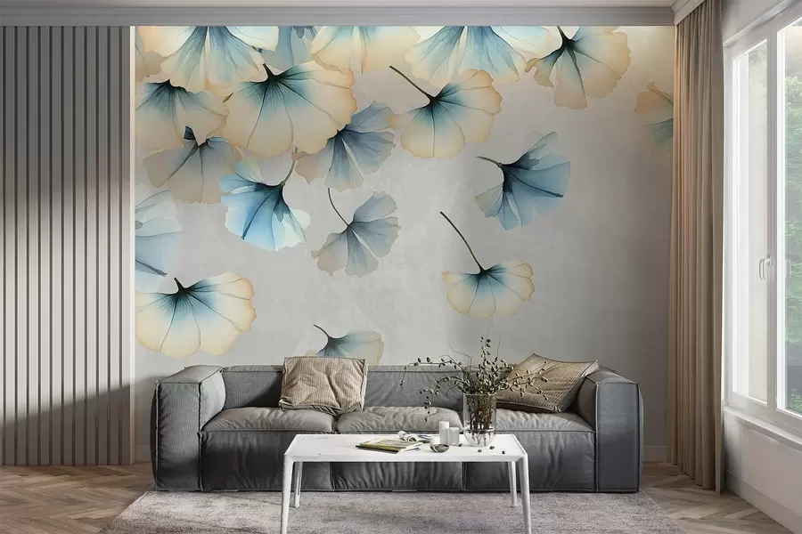 Fototapeedid Pastelsiniste ja kollaste ginkgo lehtede õrnade kroonlehtedega, mis hõljuvad õhus tekstuurilisel taustal w08578v1