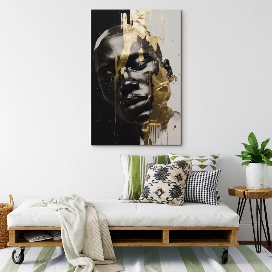 Pilt Abstraktne mehe portree, mis on maalitud sujuvates must-valgetes toonides, mida rõhutavad erksad soojavärvilised pintslitõmbed, mis loovad dünaamilise efekti. s42623