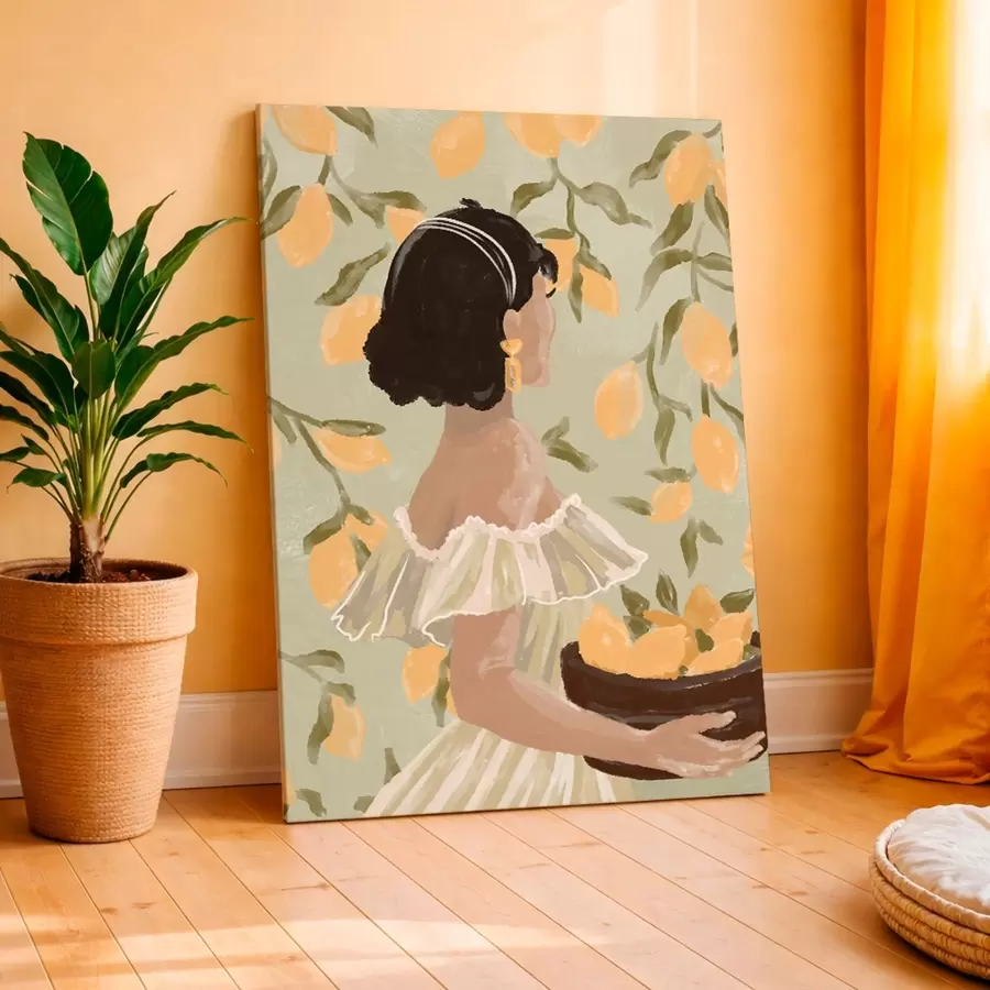 Pilt Naine, kes hoiab käes kaussi sidrunitega s48023